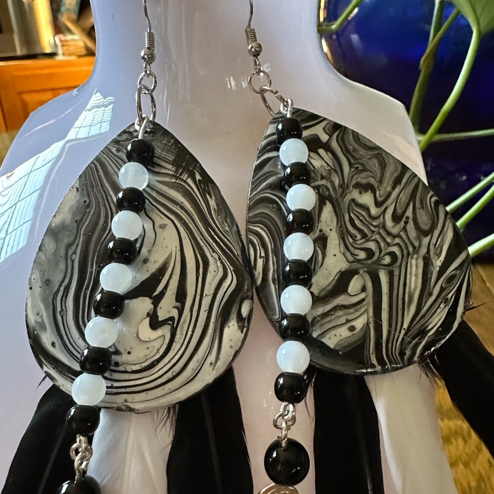 Abstract wooden earrings with feathers and beads